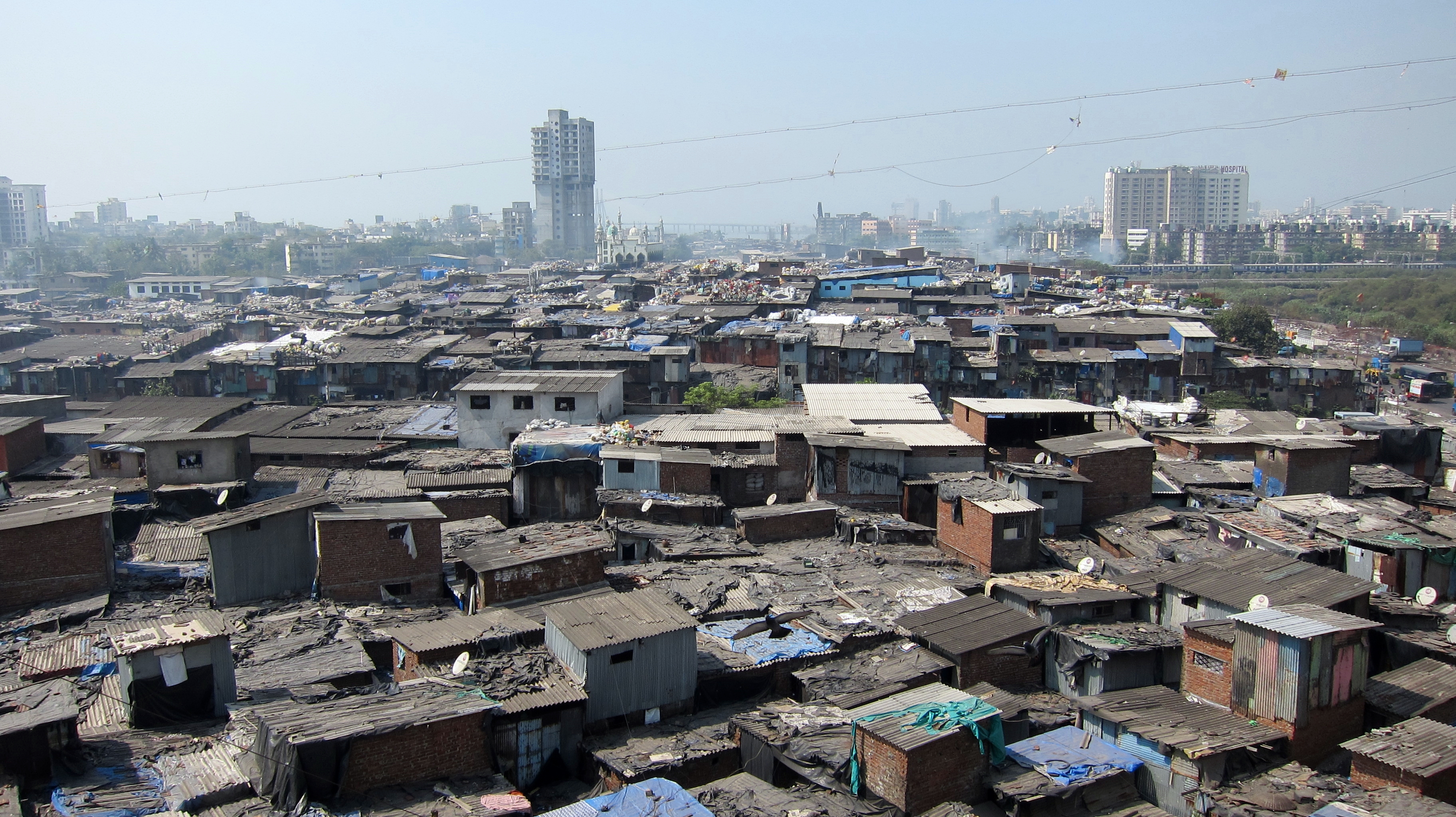  Tender conditions for Dharavi slum redevelopment were revised in public interest, not to favour Adani: Maharashtra to Bombay High Court